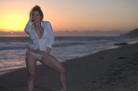 Middle-aged woman Kiki Daire models a blouse and bikini on a beach at sunset - #170205