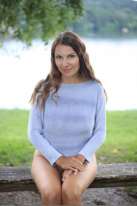 Alluring babe Belove shows her tanned boobs and her trimmed pussy outdoors - Image 1 of 20  in Model category   featuring Belove 