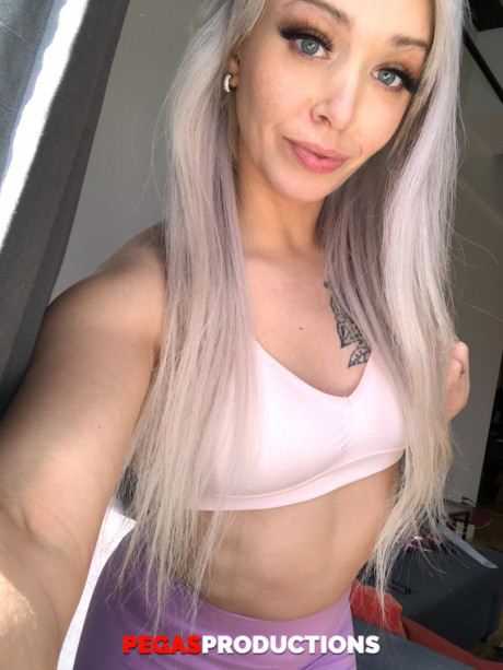 Platinum blonde doll Kate Brixxton strips and displays her hot inked body - #1058866