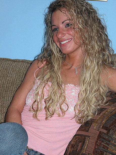 Slender curly-haired MILF Holly toys her tight love hole up close on the sofa - Image 2 of 20  in Dildo category   featuring Holly 