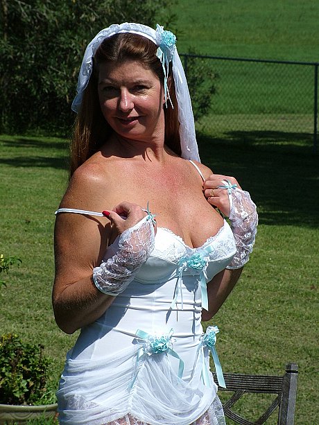 Slutty mature bride reveals her juggs and fingers her clam on an outdoor chair - Image 6 of 20  in Outdoor category   featuring Dee Delmar 