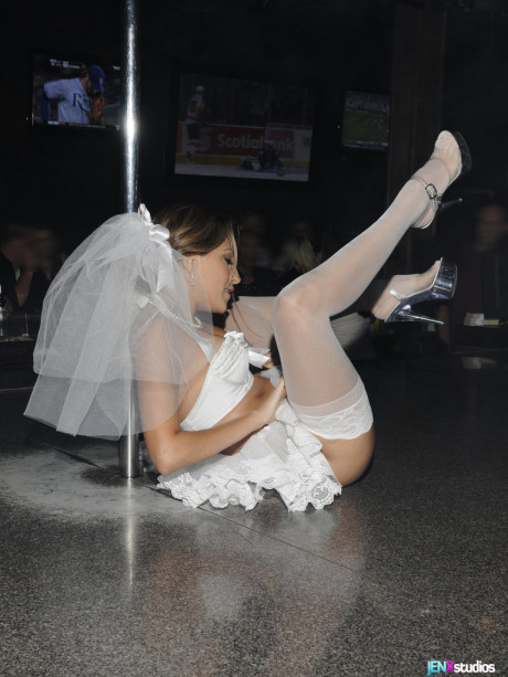 Jenna Haze puts on a show in a strip club while wearing white stockings - #669677