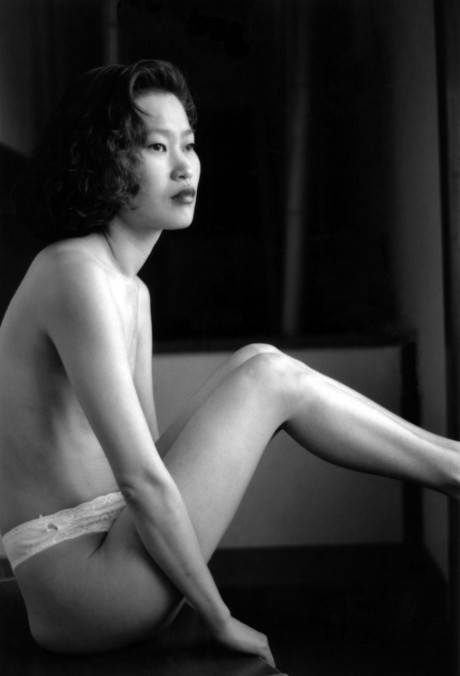 Asian babe shows her skinny body & her tiny boobs in a ebony & white scene - #811476