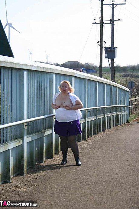 Obese British amateur Lexie Cummings takes a piss before crossing a footbridge - Image 10 of 20  in Outdoor category   featuring Lexie Cummings 