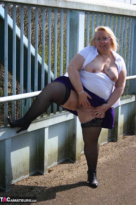 Obese British amateur Lexie Cummings takes a piss before crossing a footbridge - Image 11 of 20  in Outdoor category   featuring Lexie Cummings 