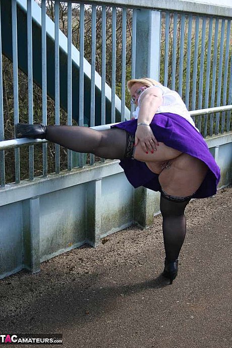 Obese British amateur Lexie Cummings takes a piss before crossing a footbridge - Image 12 of 20  in Outdoor category   featuring Lexie Cummings 