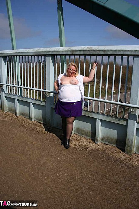 Obese British amateur Lexie Cummings takes a piss before crossing a footbridge - Image 14 of 20  in Outdoor category   featuring Lexie Cummings 