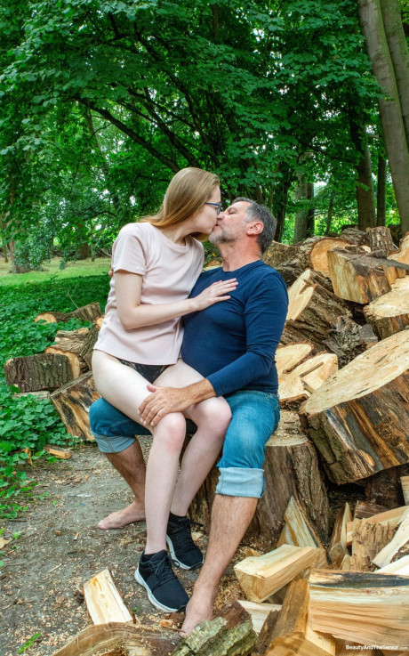 Lustful teenie Abela getting poked hard by an older husband BF man outdoors in the woodpile - #714470