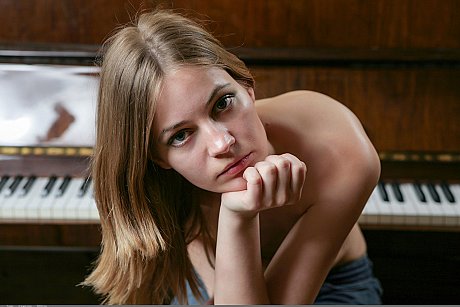 Glamorous teen babe Frosiya strips off her leggings in front of the piano - Image 18 of 20  in Model category   featuring Frosiya 