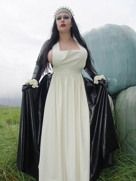 Goth woman girl lady Angelina does her laundry outdoors in a tub in latex clothing - Image 7 of 16  in Outdoor category   featuring Lady Angelina 