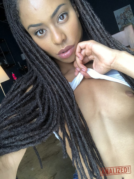 Stunning black teen Kira Noir reveals her hot behind and tiny tits in a solo - #356159