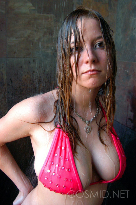 Amateur model Lisa Marie gets soaking wet while filling out a pink bikini - #1269575