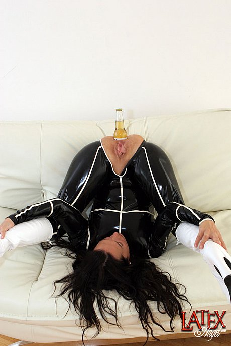 Dark haired freak sticks a beer bottle in her sleazy asshole - Image 11 of 15  in Dildo category   featuring Latex Angel 