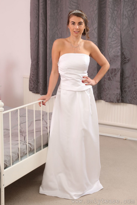 Brunette princess in white dress Sarah James undresses and reveals huge juggs - #638908