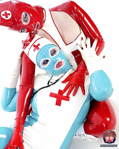 Fetish models hump each other while wearing latex nurse outfits - Image 4 of 16  in Lesbian category  