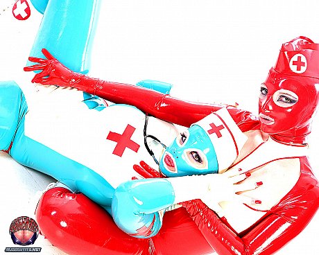 Fetish models hump each other while wearing latex nurse outfits - Image 5 of 16  in Lesbian category  