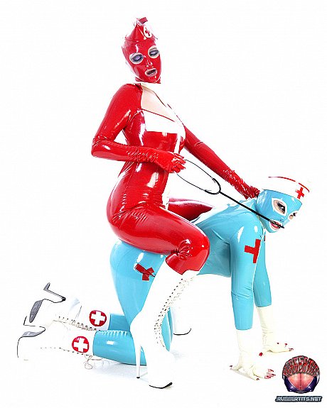 Fetish models hump each other while wearing latex nurse outfits - Image 8 of 16  in Lesbian category  