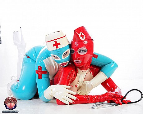 Fetish models hump each other while wearing latex nurse outfits - Image 10 of 16  in Lesbian category  