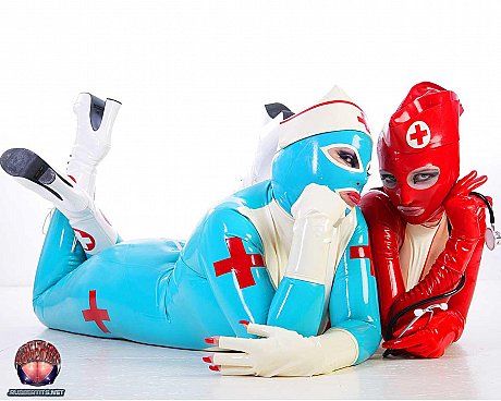 Fetish models hump each other while wearing latex nurse outfits - Image 16 of 16  in Lesbian category  