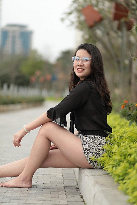 Barefoot oriental babe flaunts her pretty legs outdoors wearing a miniskirt - Image 21 of 21  in Outdoor category  