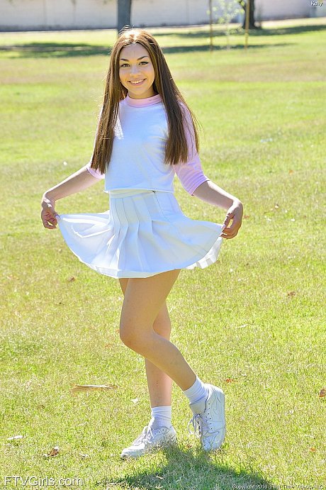 Brunette sweety Kelly reveals her tiny boobs and fingers her pussy in the park - Image 10 of 20  in Pussy category   featuring Kelly Kitten 
