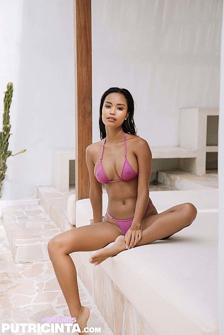 Thin babe peels off her undergarment & shows off her ravishing breasts by the pool - Image 6 of 20  in Model category   featuring Putri Cinta 