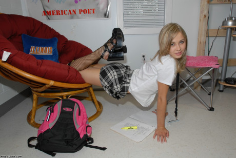 Fresh young looking blond Kasia pulls down schoolgirl skirt in thong and nylon socks - #745258