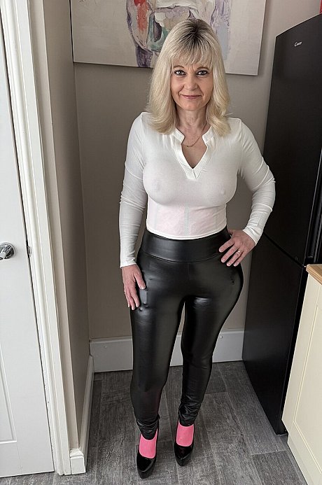 Tattooed blonde Inked MILF uncovers her big boobies while going topless - xxx porn gallery #50338 in Latex featuring Inked MILF