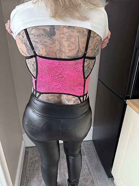 Tattooed blonde Inked MILF uncovers her big boobies while going topless - Image 5 of 16  in Latex category   featuring Inked MILF 