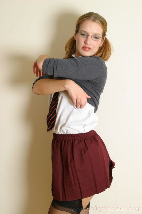 Geeky schoolgirl Kat strips and poses like a real whore in nylons - #279631