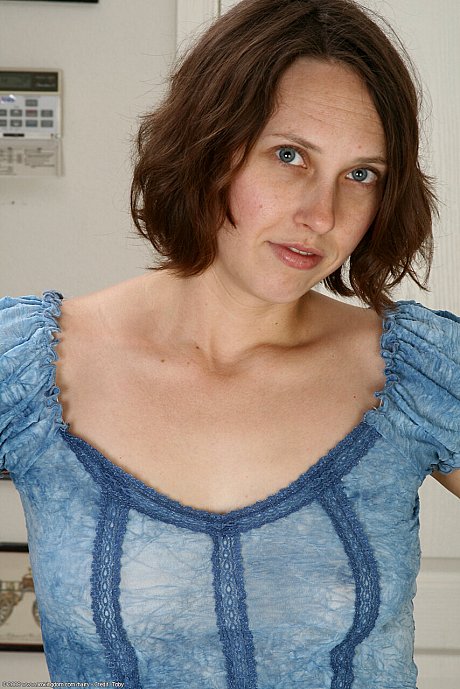 Lovely amateur young Dalia strips & shows her super hairy pierced cunt in a solo - Image 1 of 21  in Pussy category   featuring Dalia 