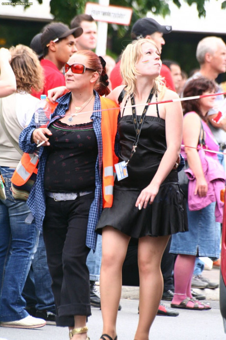 Young ladies at a street party are secretly recorded by a public voyeur - #899450