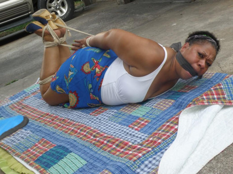 Mature black plumper is hogtied on a comforter while cleave gagged - #1267019