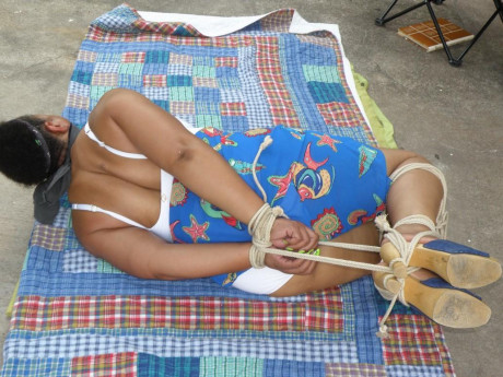 Mature black plumper is hogtied on a comforter while cleave gagged - #1267023