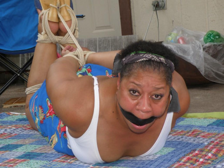 Mature black plumper is hogtied on a comforter while cleave gagged - #1267027