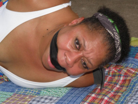 Mature black plumper is hogtied on a comforter while cleave gagged - #1267032