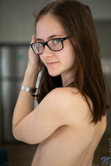 Skinny MILF in glasses Eva May strips nude & spreads her inviting hairy snatch - #1358213