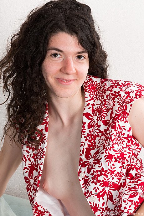 Playful American Silki Smith strips to her heels and exposes her bushy crotch - Image 9 of 21  in Pussy category   featuring Silki Smith 