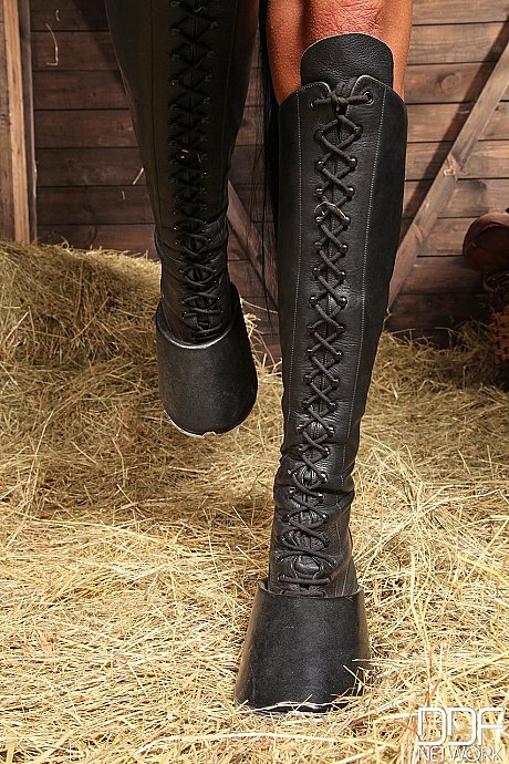 Devilish babe Annett posing and masturbating in the barn in a BDSM solo - Image 16 of 21  in Legs category   featuring Annett 