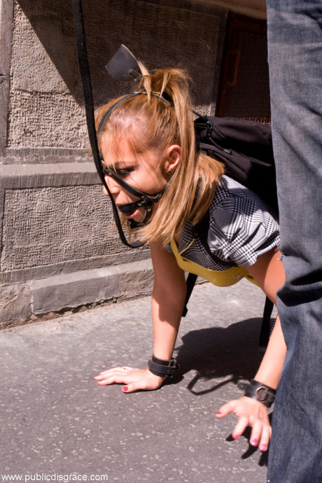 Romanian sweety Jennifer Love crawling on the street ball-gagged and shackled - #730918