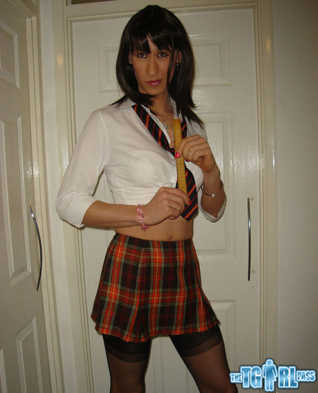 Transsexual wearing a horny tartan skirt shoots her load over a juicy booty - #57600
