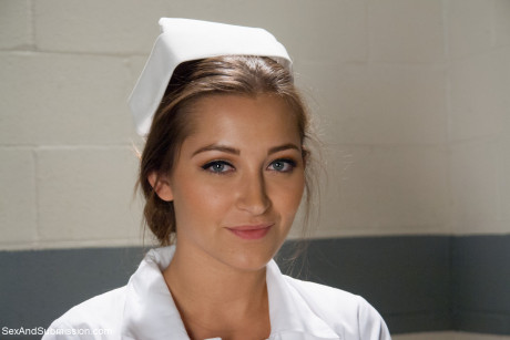 Pretty nurse with a nice booty Dani Daniels strips and poses in high heels - #979713