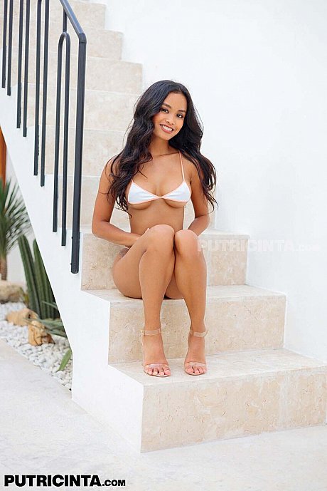 Alluring teenie Putri Cinta uncovers her pretty boobs while posing in a bikini - Image 18 of 20  in Outdoor category   featuring Putri Cinta 