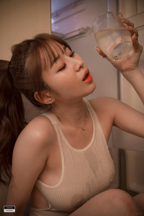 Marvelous South Korean model flaunts her large melons while posing in her swimsuit - #1488835
