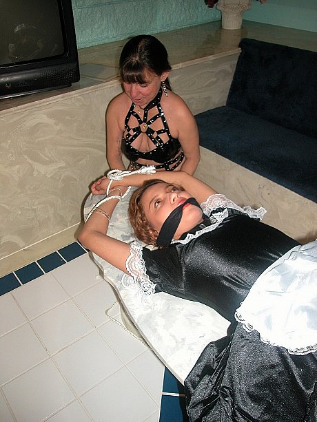 Pretty maid Cinnamon gets tied up and toyed by old domme Vixen - Image 5 of 20  in Lesbian category   featuring Vixen, Cinnamon 