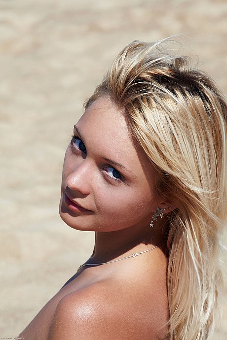 Adorable blondie Lada displays her pretty shaved pussy on a sandy beach - Image 15 of 20  in Pussy category   featuring Lada 