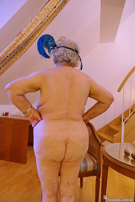 Fat mature old lady Galfira undresses and poses naked in a solo show - Image 19 of 21  in Ass category   featuring Galfira 