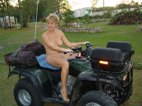 Amateur swinger with fake boobies Tracy blow poses undressed on a fourwheeler - #476595