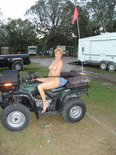 Amateur swinger with fake boobies Tracy blow poses undressed on a fourwheeler - #476601