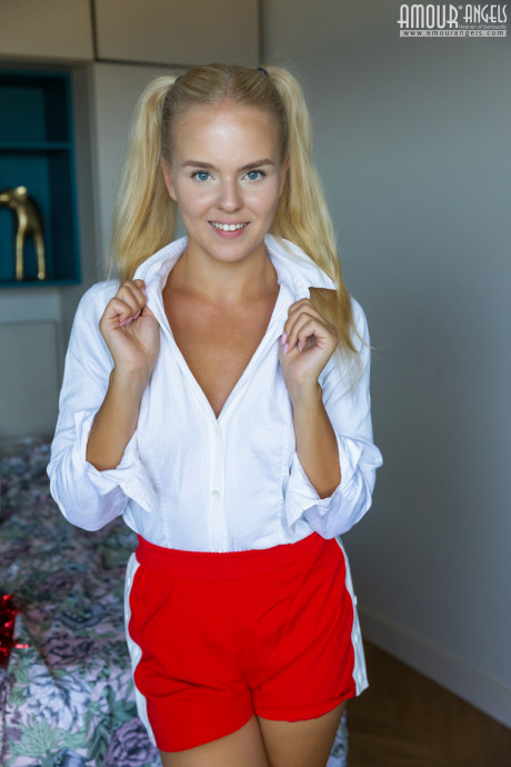 Adorable blonde young Decima holds pom-poms while getting naked - #1546264